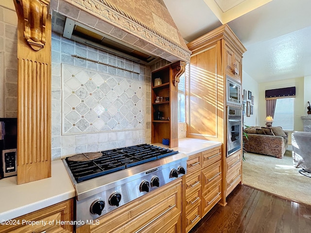 kitchen with dark hardwood / wood-style floors, stainless steel appliances, and custom exhaust hood