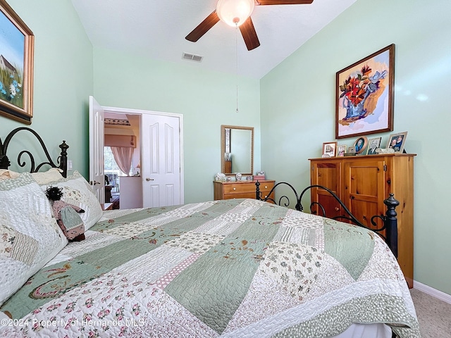 bedroom featuring carpet flooring, ceiling fan, and vaulted ceiling