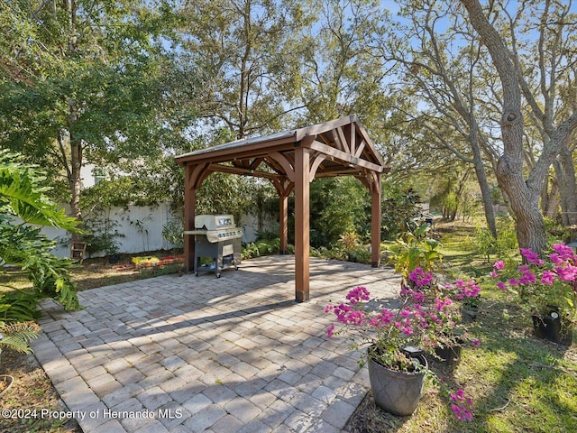 92 Randolph Ave, Spring Hill, FL 34606 - view of patio / terrace featuring a gazebo and grilling area