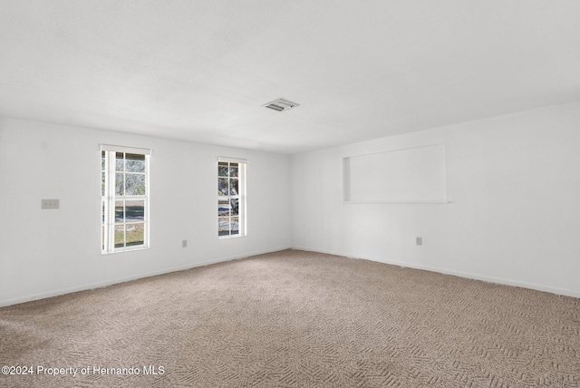 view of carpeted spare room