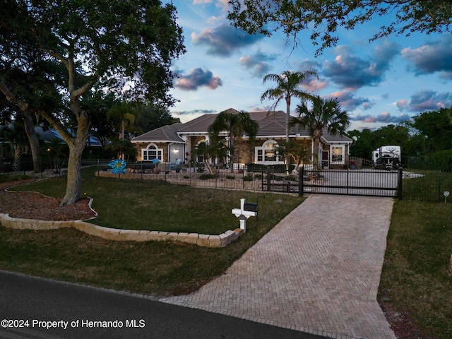 3765 John Anderson Dr, Ormond Beach, FL 32176 - ranch-style house with a lawn