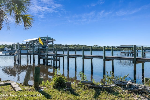 view of dock with a water view