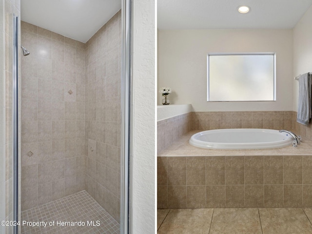 bathroom with tile patterned flooring and independent shower and bath