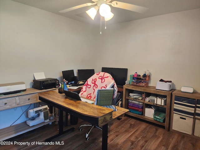 office area with ceiling fan and dark hardwood / wood-style flooring