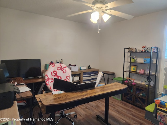 office with ceiling fan and wood-type flooring