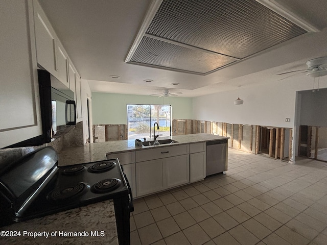 kitchen featuring white cabinets, ceiling fan, black appliances, and sink