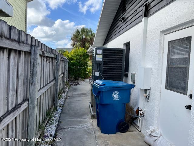 view of property exterior with central AC unit