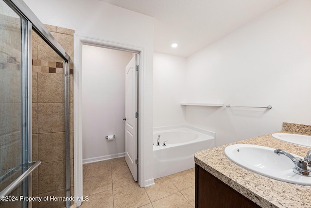 bathroom with vanity, tile patterned floors, and independent shower and bath