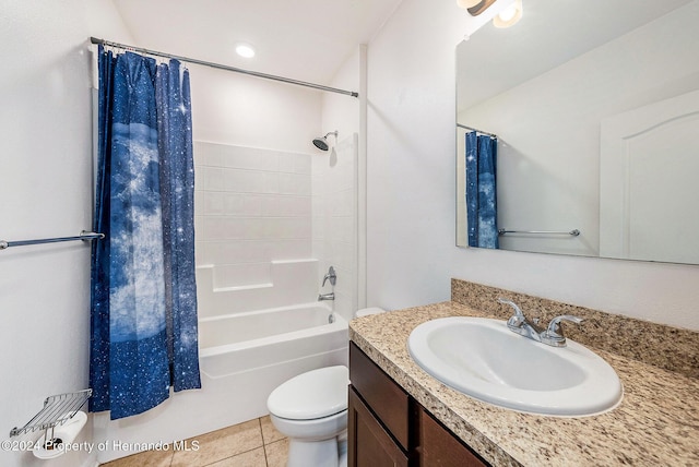 full bathroom featuring tile patterned flooring, vanity, shower / tub combo, and toilet