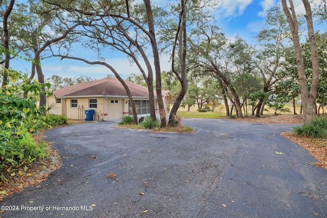 ranch-style house with a garage