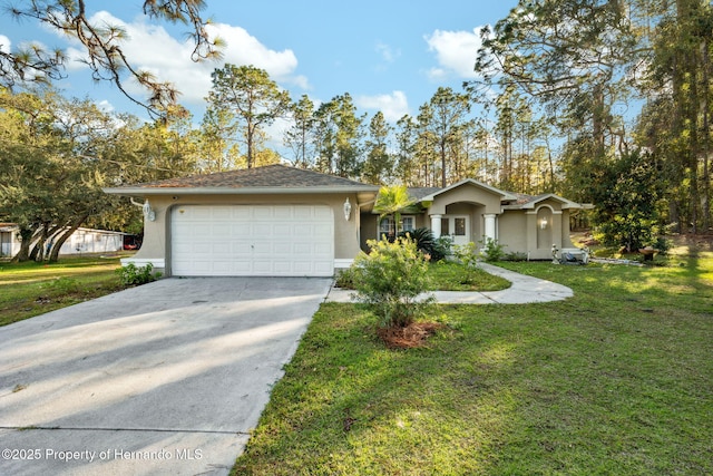 single story home featuring a garage and a front yard