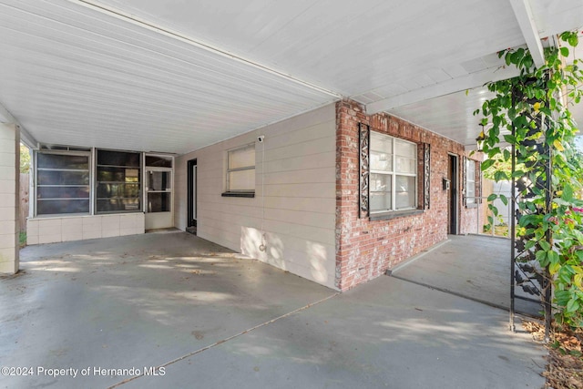 view of patio featuring a carport