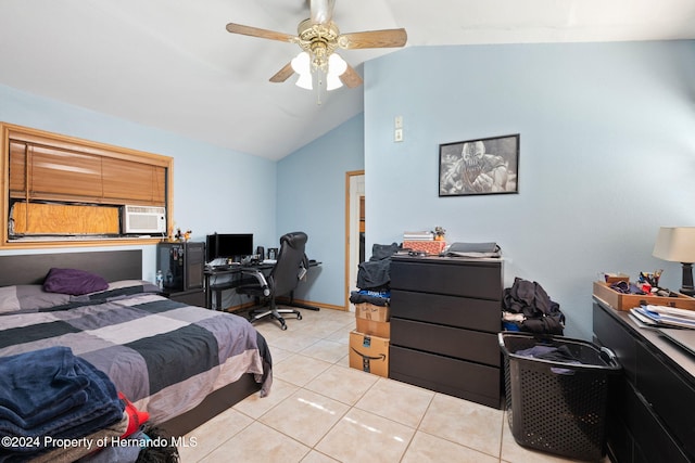 bedroom with ceiling fan, light tile patterned floors, and lofted ceiling