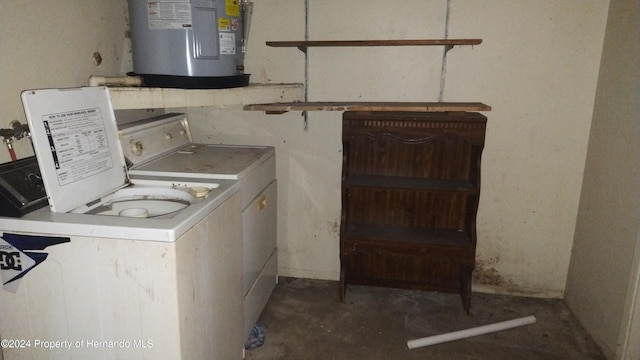 laundry room with independent washer and dryer and electric water heater