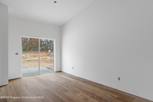 spare room with light wood-type flooring