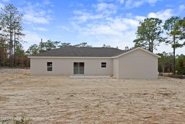 rear view of property with a patio area