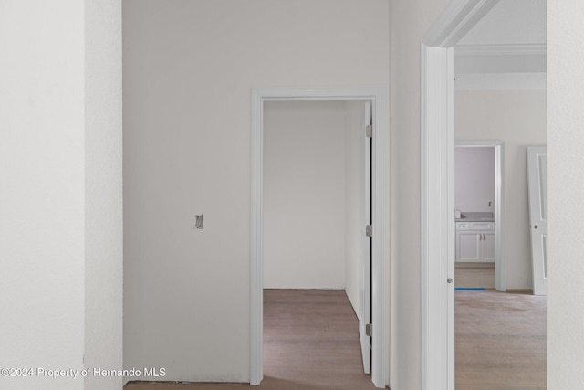 corridor featuring light hardwood / wood-style flooring