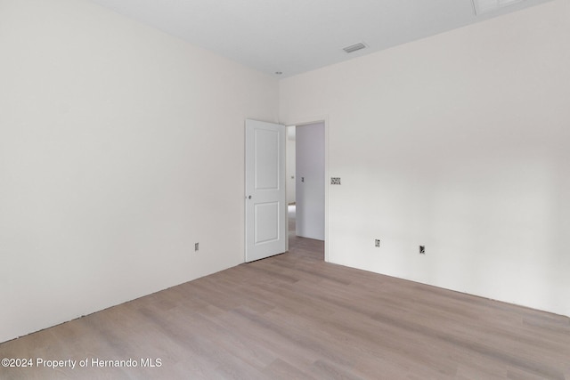 empty room featuring light hardwood / wood-style floors