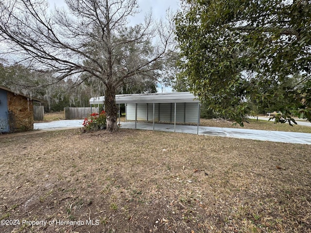 exterior space with a carport