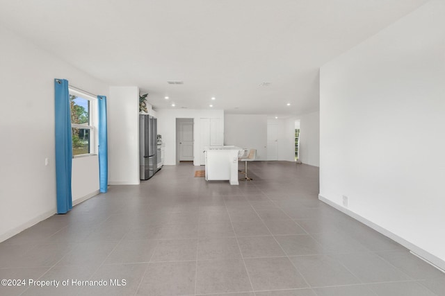 interior space with light tile patterned flooring