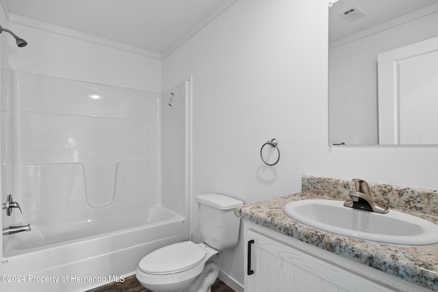 full bathroom featuring vanity, toilet, shower / tub combination, and crown molding