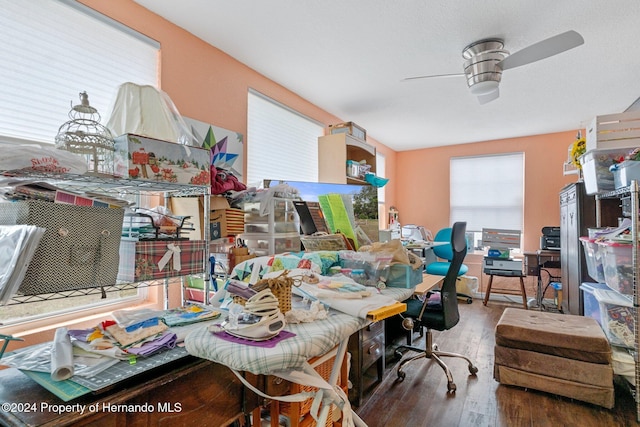 home office featuring ceiling fan and hardwood / wood-style flooring