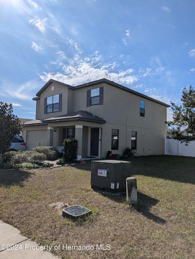 front facade with a front lawn