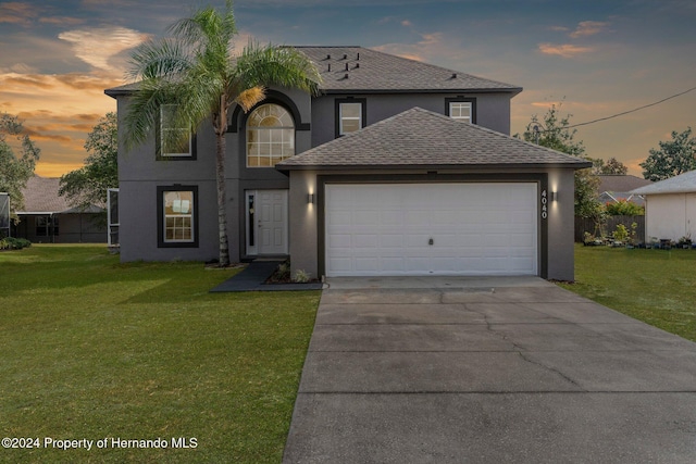 view of front of home with a yard