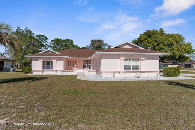 view of front of property with a front lawn