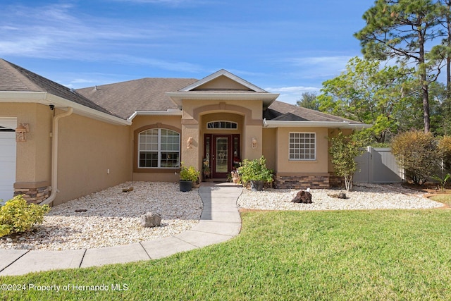 view of front of house with a front yard