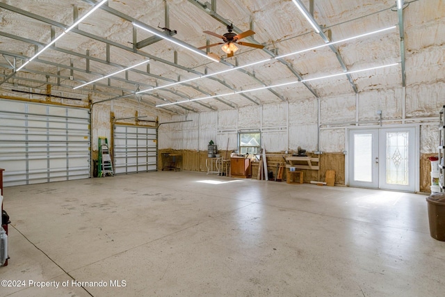 garage with french doors and ceiling fan