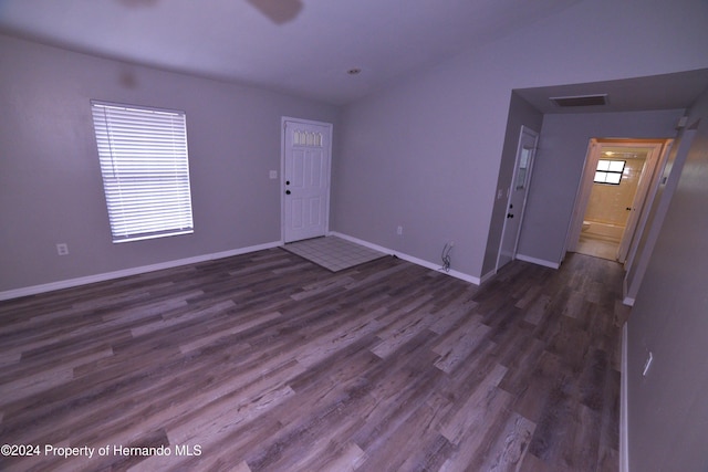 foyer with dark hardwood / wood-style flooring