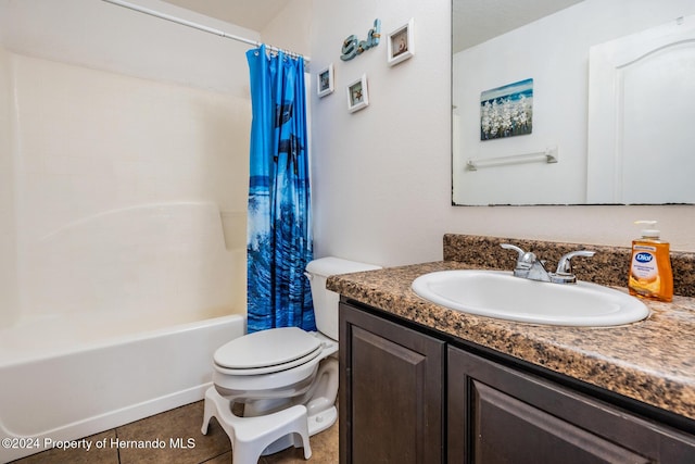 full bathroom featuring tile patterned flooring, vanity, toilet, and shower / tub combo with curtain