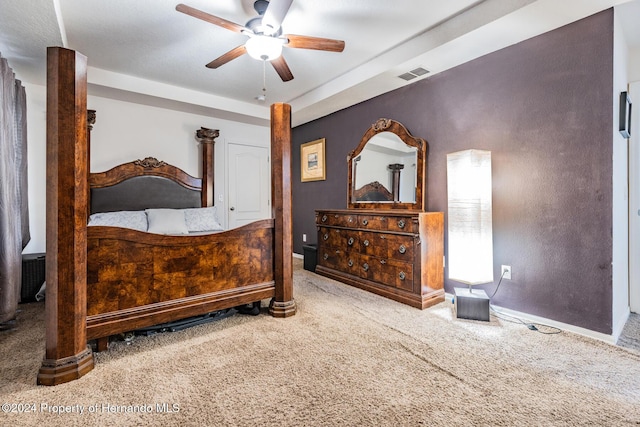 bedroom featuring ceiling fan and carpet floors