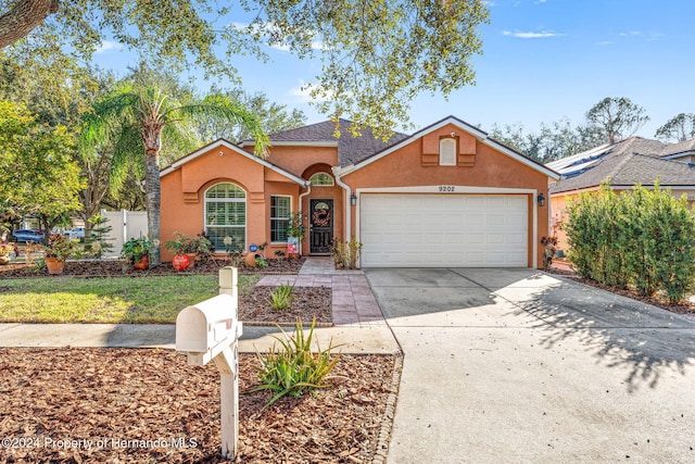 view of front of house with a garage