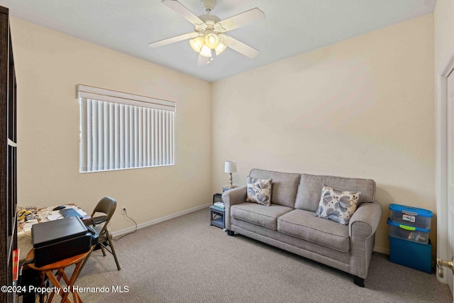 office space with ceiling fan and carpet floors