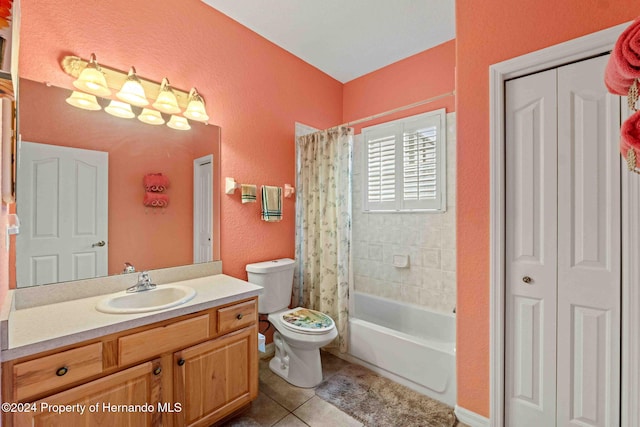 full bathroom featuring tile patterned flooring, vanity, toilet, and shower / bath combo