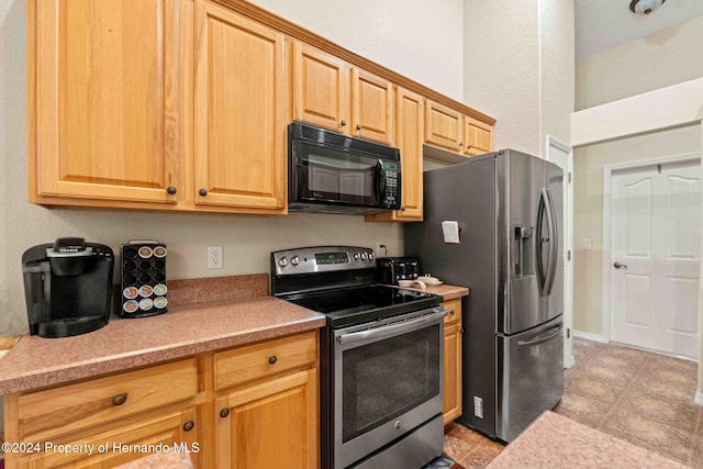 kitchen with appliances with stainless steel finishes