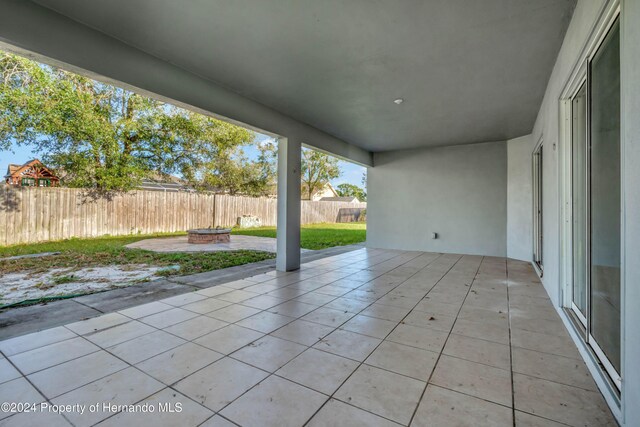 view of patio / terrace with a fire pit