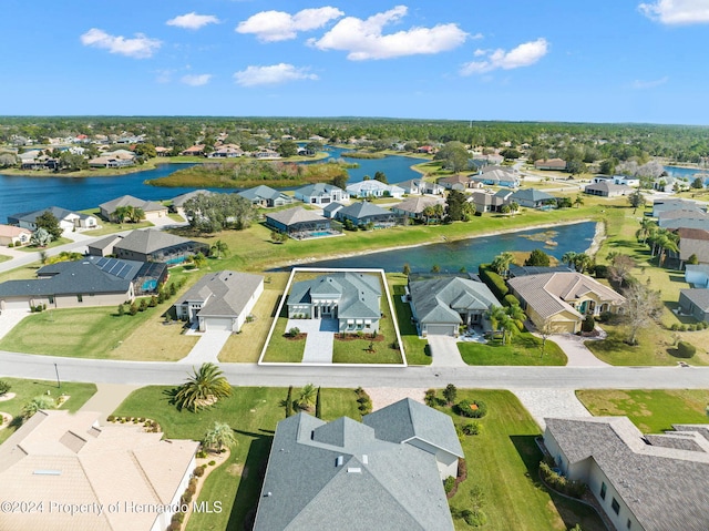 drone / aerial view featuring a water view