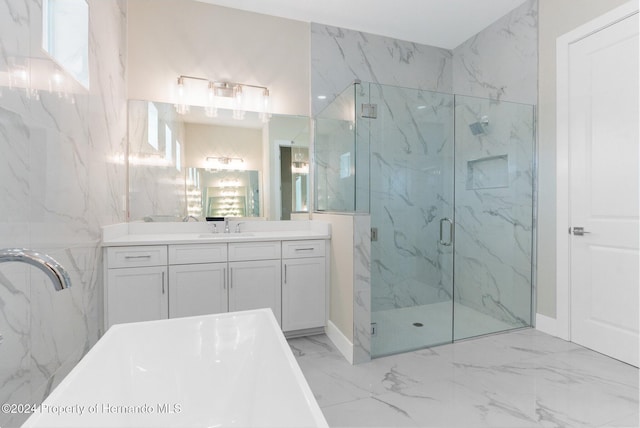 bathroom with vanity and an enclosed shower