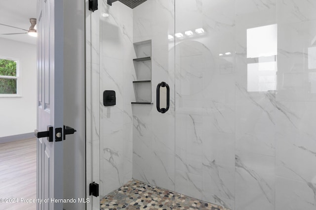 bathroom with an enclosed shower