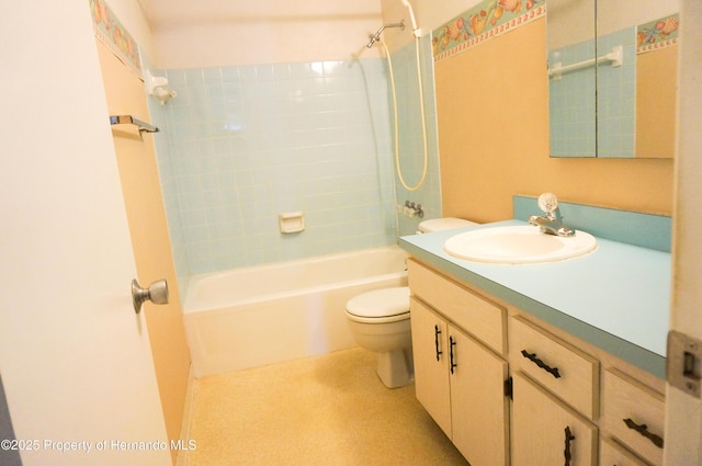 full bathroom with shower / washtub combination, vanity, and toilet