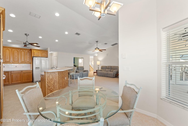 dining space with ceiling fan