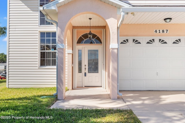 property entrance featuring a garage