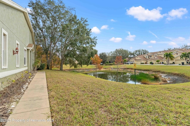 view of yard featuring a water view