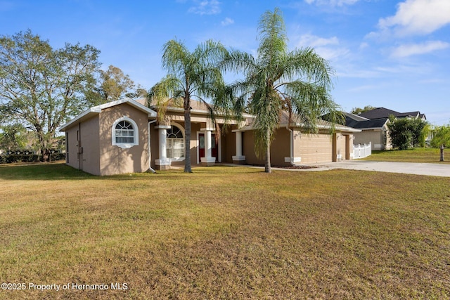 single story home with a front lawn and a garage