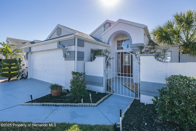 view of front of home featuring a garage