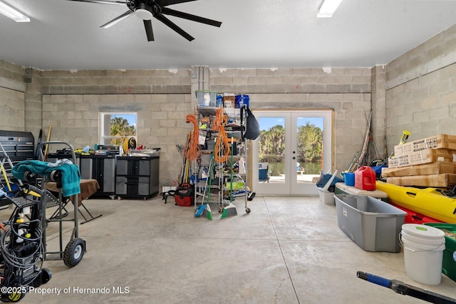 interior space featuring french doors, a textured ceiling, a wealth of natural light, and ceiling fan