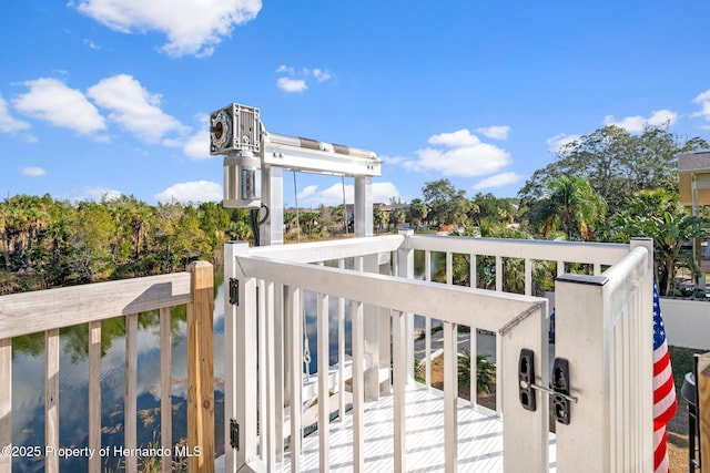 deck featuring a water view